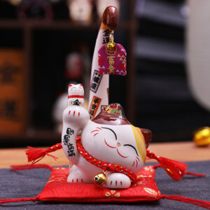 Japanese style white Lucky Cat with right arm up. It is powered by electricity to make its tails swing, a decoration for indoor.