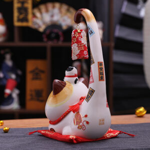 Back view of Japanese style white Lucky Cat. It is a decoration for indoor.