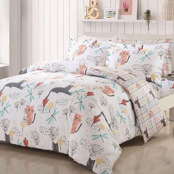 A set of white bedding sheet with cartoon cat pattern.