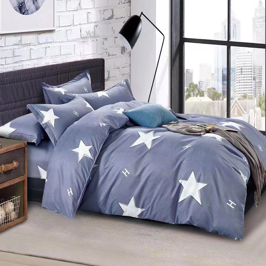 A set of blue bedding sheet with white star pattern.