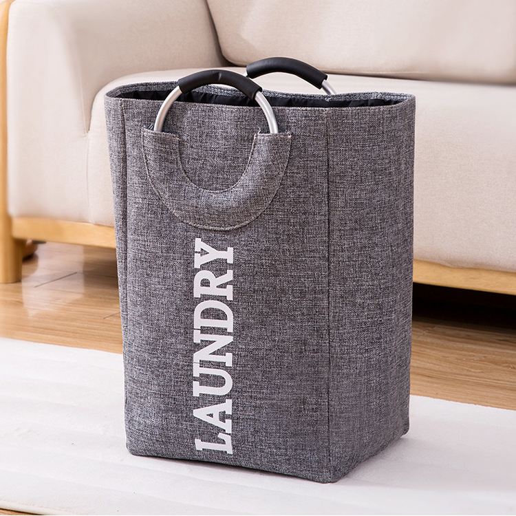 A grey laundry basket with text "Laundry."