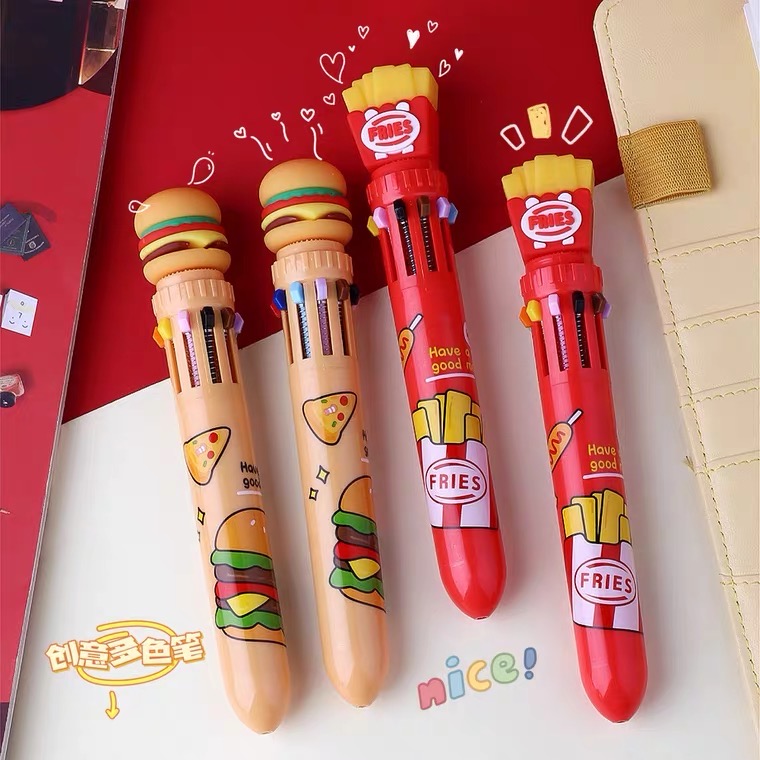 A group of french fries and burger shaped pens on a red and white background.