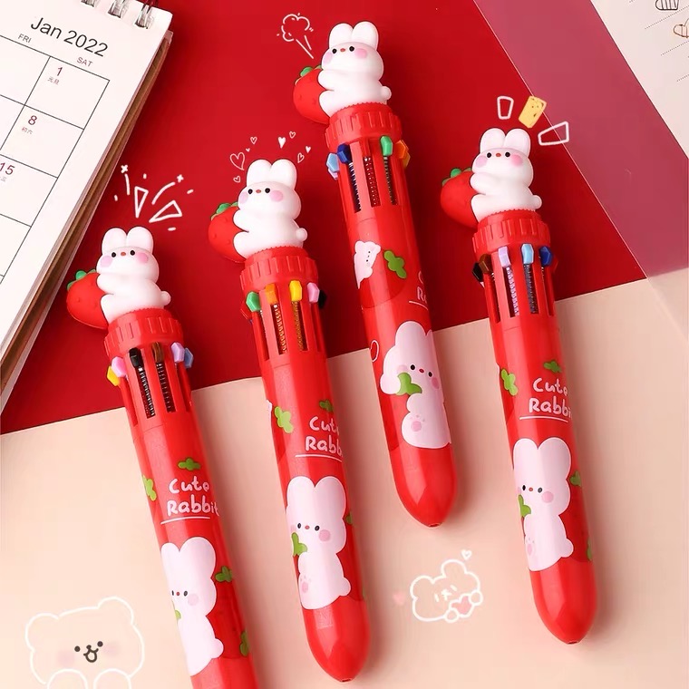 A group of white rabbit shaped pens on a red background.