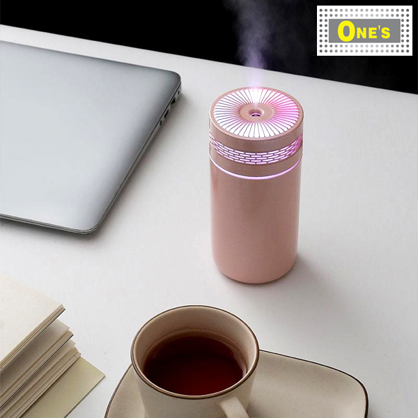 A Car Humidifiers in pink on the table.
