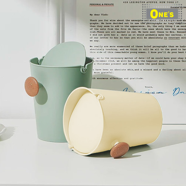 Home item tool mini Trash Bin. Plastic in green or beige color.